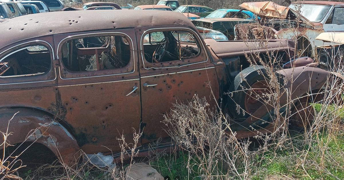 Old vehicle in a salvage yard